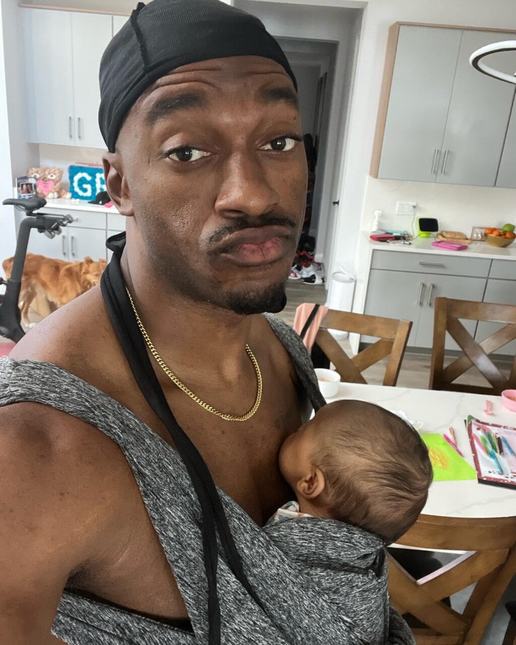 Robert Griffin III with a Baby Carrier